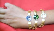 Pulseira em capim dourado com pedras